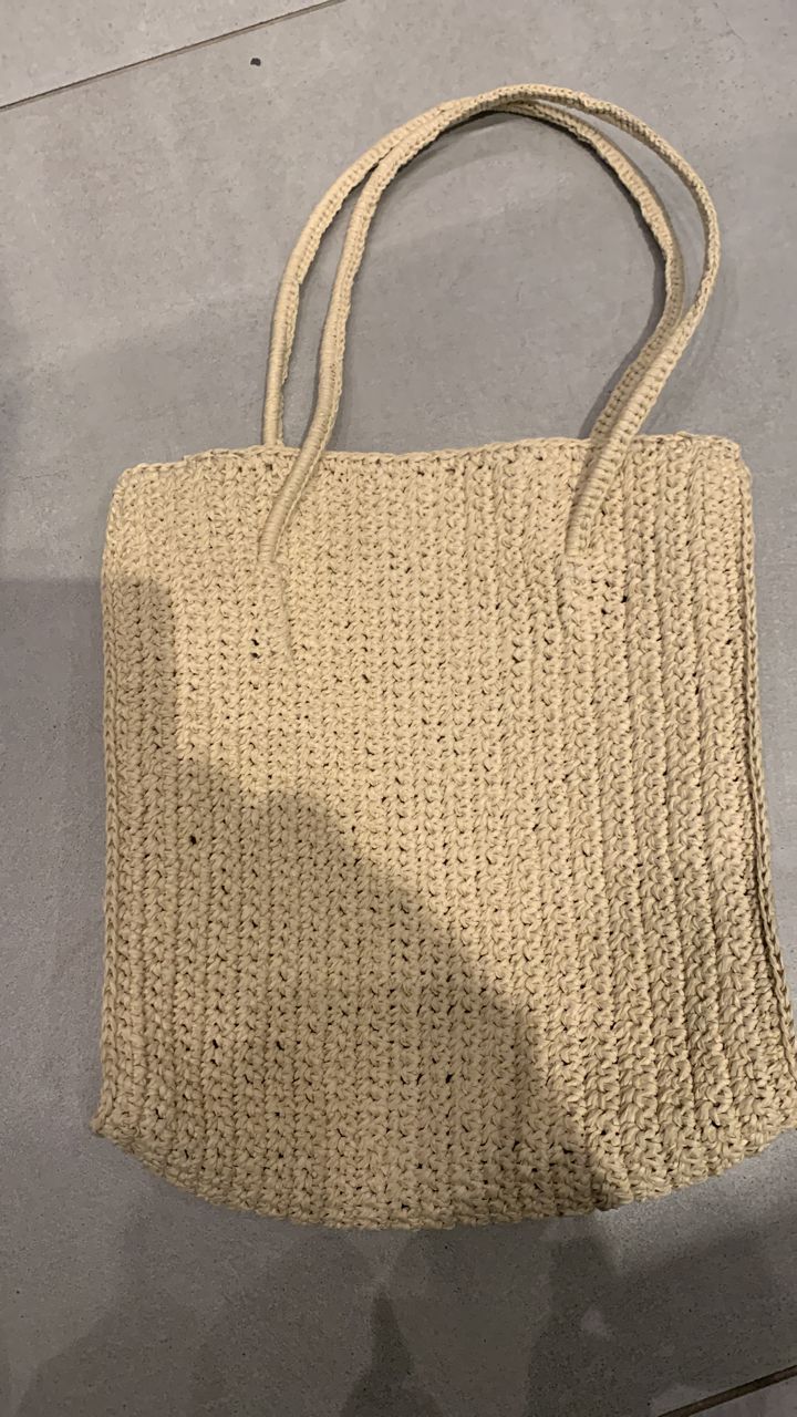Woven handbag with handles