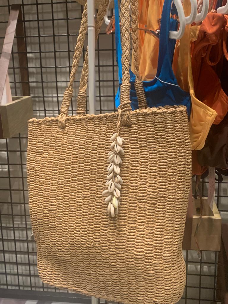 Large straw bag with hanging shells